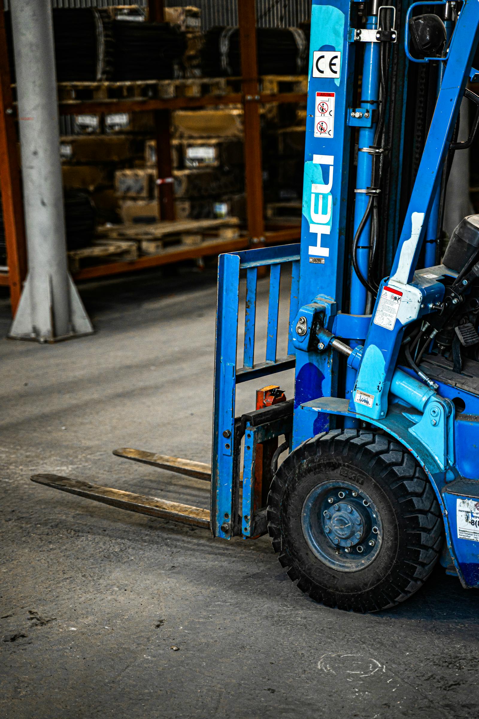 Forklift operator certification in warehouse load handling.